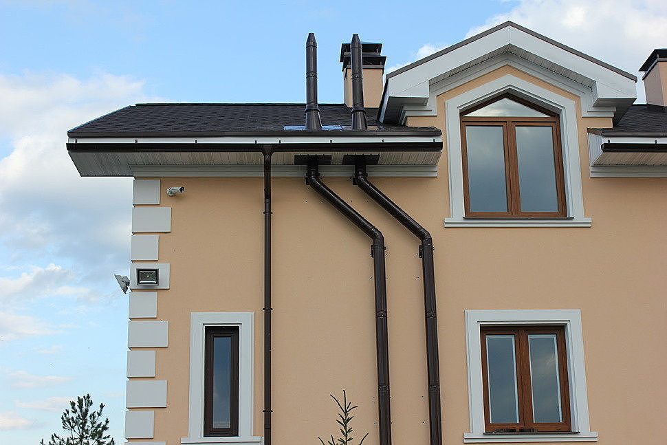 Где лучше всего поставить дымоход на крыше дома?